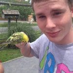 Sea Cadet holding a bird