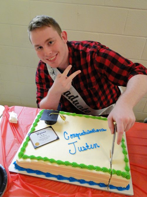 sea cadet with graduation cake