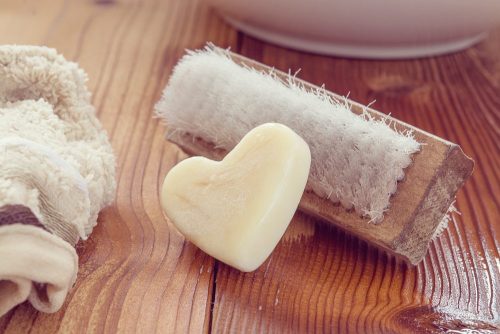 heart-shaped soap and brush